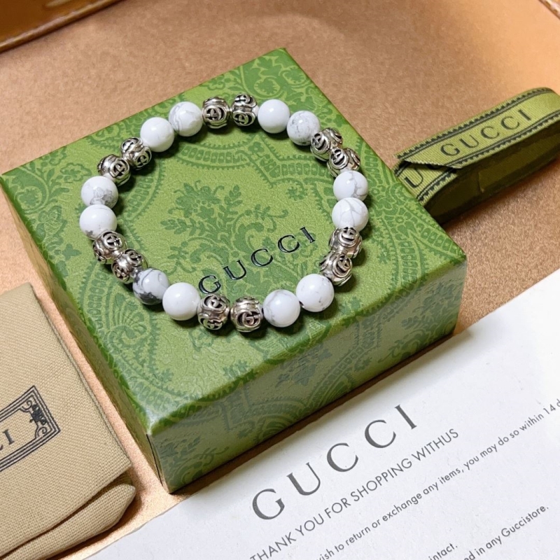 G*u*i bracelets